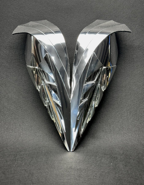 Chrome bustplate inspired on artdeco decade
