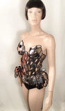 Chrome art nouveau inspired corset , burlesque performer futuristic gear